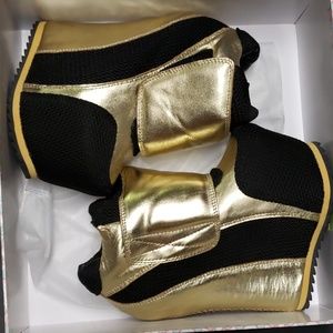 Gold and black Jeffrey Campbell succession
